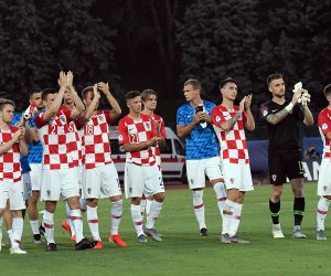 epa07656544 Croatia's players react at the end of the UEFA European Under-21 Championship 2019 Group C soccer match between Romania and Croatia in San Marino, 18 June 2019.  EPA/LUCA FANFANI