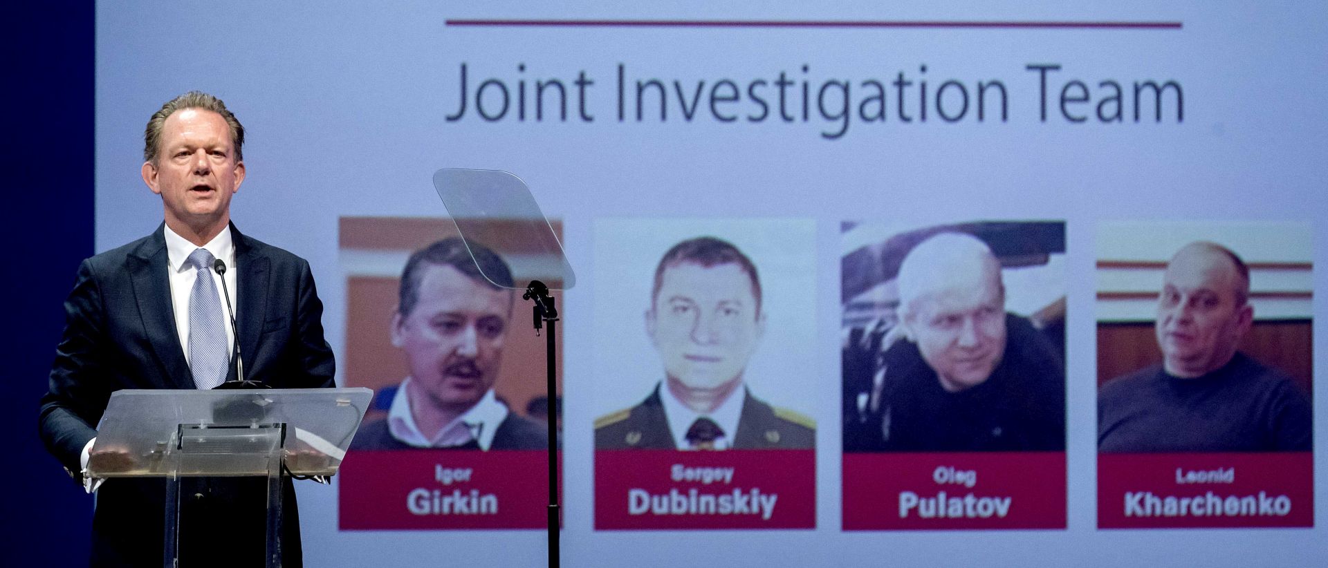 epa07657675 Fred Westerbeke of the Joint Investigation Team (JIT) at the press conference of the JIT on the ongoing investigation of the Malaysia Airlines MH17 crash in 2014, in Nieuwegein, The Netherlands, 19 June 2019. Reports state that Dutch prosecutors are to put four people on trial for murder next year over the shooting down of flight MH17 over Ukraine, in which 298 people were killed. The alleged suspects named are Igor Girkin, Oleg Pulatov, Sergey Dubinskiy, Leonid Kharchenko.  EPA/ROBIN VAN LONKHUIJSEN