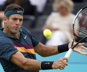 epa07657961 Argentina's Juan Martin del Potro serves to Canada's Denis Shapovalov during their round 32 match at the Fever Tree Championship at Queen's Club in London, Britain, 19 June 2019. The tournament runs from 17th June till 23 June 2019.  EPA/WILL OLIVER