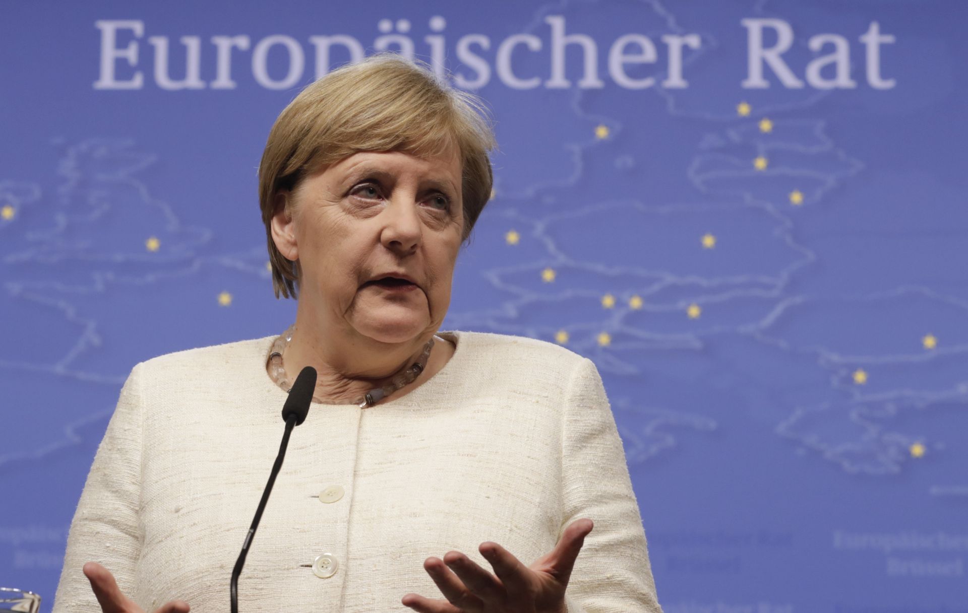 epa07662040 German Chancellor Angela Merkel speaks during a press conference at the end of first day at the start of European Council Summit in Brussels, Belgium, 21 June 2019. European leaders are expected to discuss new leadership posts for the EU's next institutional cycle and adopt the bloc's strategic agenda for 2019-2024.  EPA/OLIVIER HOSLET