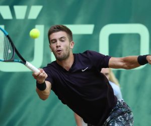 epa07663807 Borna Coric from Croatia in action against Pierre-Hugues Herbert from France in their quarter final match at the ATP Tennis Tournament Noventi Open (former Gerry Weber Open) in Halle Westphalia, Germany, 21 June 2019.  EPA/FOCKE STRANGMANN