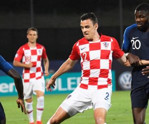 epa07664495 Croatia's Filip Uremovic (C) in action against France's Marcus Thuram (R) during the UEFA European Under-21 Championship 2019 group C soccer match between France and Croatia in Serravalle, San Marino, 21 June 2019.  EPA/LUCA FANFANI