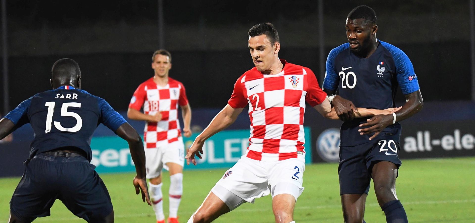epa07664495 Croatia's Filip Uremovic (C) in action against France's Marcus Thuram (R) during the UEFA European Under-21 Championship 2019 group C soccer match between France and Croatia in Serravalle, San Marino, 21 June 2019.  EPA/LUCA FANFANI