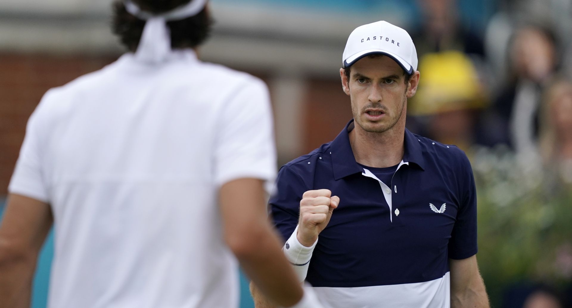 epa07669078 Britain's Andy Murray (R) with Feliciano Lopez of Spain (L) during their mens doubles final match against Britain's Joe Salisbury and Rajeev Ram at the Fever Tree Championship at Queen's Club in London, Britain, 23 June 2019. The tournament runs from 17th June till 23 June 2019.  EPA/WILL OLIVER