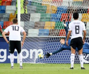 epa07669440 Austria's Kevin Danso (L) scores from the penalty spot the goal 1-1 during the Uefa European Under-21 Championship 2019 - Group B match between Austria and Germany in Udine, Italy, 23 June 2019.  EPA/GABRIELE MENIS