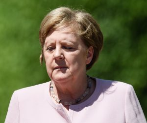 epa07677008 (FILE) - German Chancellor Angela Merkel during a reception with military honors for visiting Ukraine's President Zelensky at the Chancellery in Berlin, Germany, 18 June 2019 (reissued 27 June 2019). German Chancellor Merkel, during an official event for the handing over of certificates of appointment and discharge to Ministers of Justice at Bellevue Palace in Berlin on 27 June 2019, was seen trembling, once again, eight days after a similar incident that occurred on 18 June 2019, during Ukraine's President Zelensky's visit to the country, media reported. The first episode was attributed to heat and dehydration as she said had forgotten to drink enough water. Germany as well as other European countries is affected by a heat wave with temperatures soaring above 30 degrees Celsius.  EPA/CLEMENS BILAN