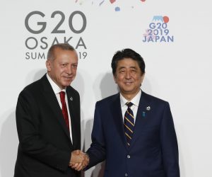 epa07678977 Turkish President Tayyip Erdogan (L) is welcomed by Japanese Prime Minister Shinzo Abe (R) upon his arrival for a welcome ceremony on the first day of the G20 summit in Osaka, Japan, 28 June 2019. It is the first time Japan hosts a G20 summit. The summit gathers leaders from 19 countries and the European Union to discuss topics such as global economy, trade and investment, innovation and employment.  EPA/KIM KYUNG HOON / POOL