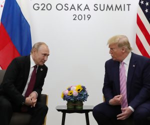 epa07679081 Russian President Vladimir Putin (L) and US President Donald J. Trump (R) during their meeting on the sidelines of the G20 leaders summit in Osaka, Japan, 28 June 2019. The summit gathers leaders from 19 countries and the European Union to discuss topics such as global economy, trade and investment, innovation and employment.  EPA/MICHAEL KLIMENTYEV/SPUTNIK/KREMLIN POOL