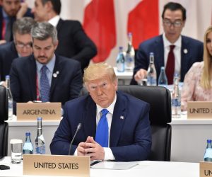 epa07681417 US President Donald Trump (R) attends the second day of the G20 summit in Osaka, Japan, 29 June 2019. It is the first time Japan will host a G20 summit. The summit gathers leaders from 19 countries and the European Union to discuss topics such as global economy, trade and investment, innovation and employment.  EPA/KAZUHIRO NOGI / POOL