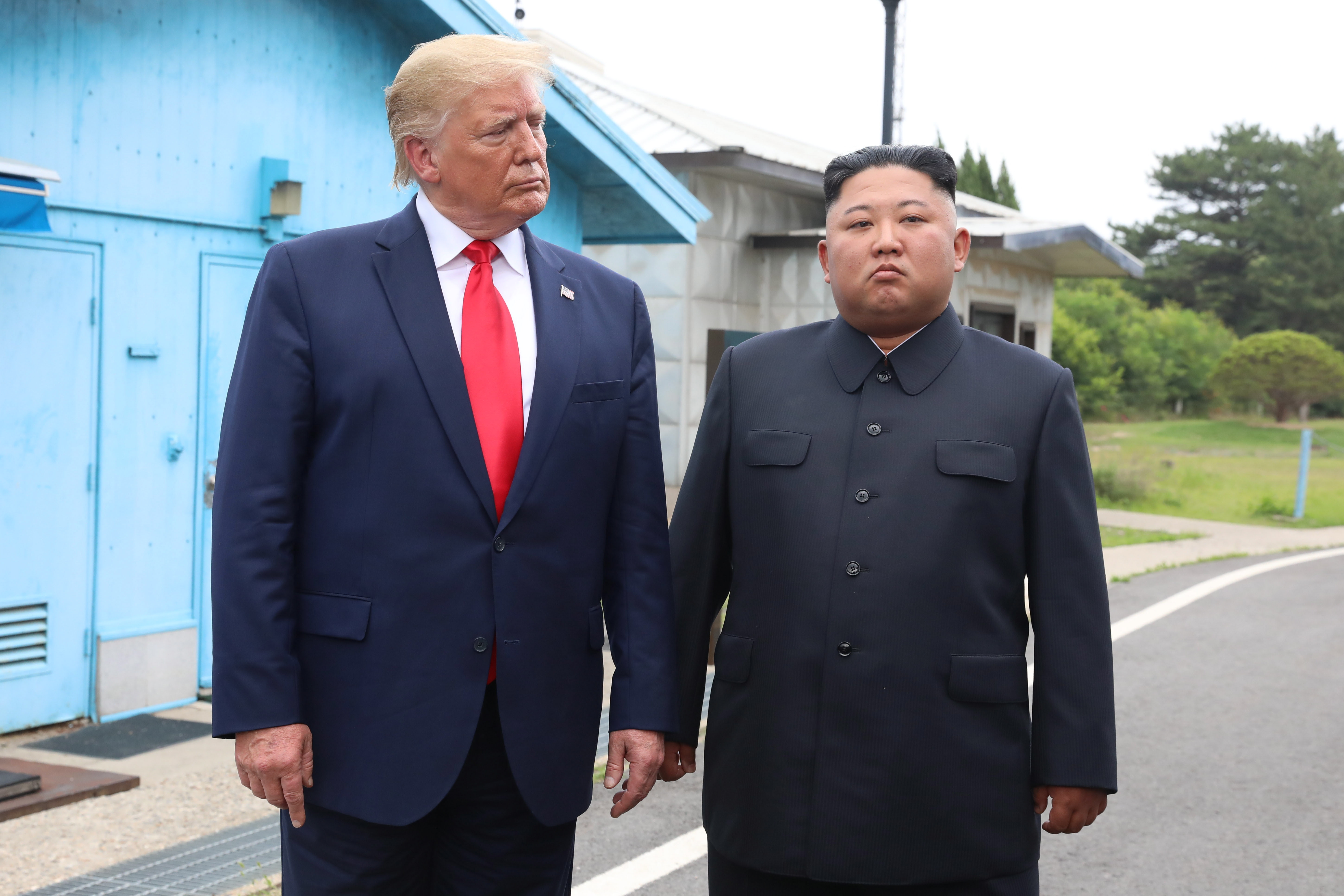 epa07683981 US President Donald J. Trump (L) with North Korean leader Kim Jong-un before they hold talks at the Freedom House on the southern side of the truce village of Panmunjom in the Demilitarized Zone, which separates the two Koreas, 30 June 2019. The US leader arrived in South Korean on 29 June for a two-day visit that will include a meeting with South Korean President Moon Jae-in and a trip to the Demilitarized Zone.  EPA/YONHAP SOUTH KOREA OUT