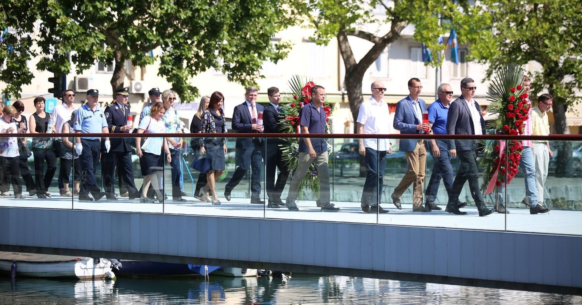 25.06.2019., Rijeka - Povodom obiljezavanja Dana drzavnosti izaslanstvo Grada Rijeke i braniteljske udruge polozile su vijence na mostu branitelja.  
Photo: Nel Pavletic/PIXSELL