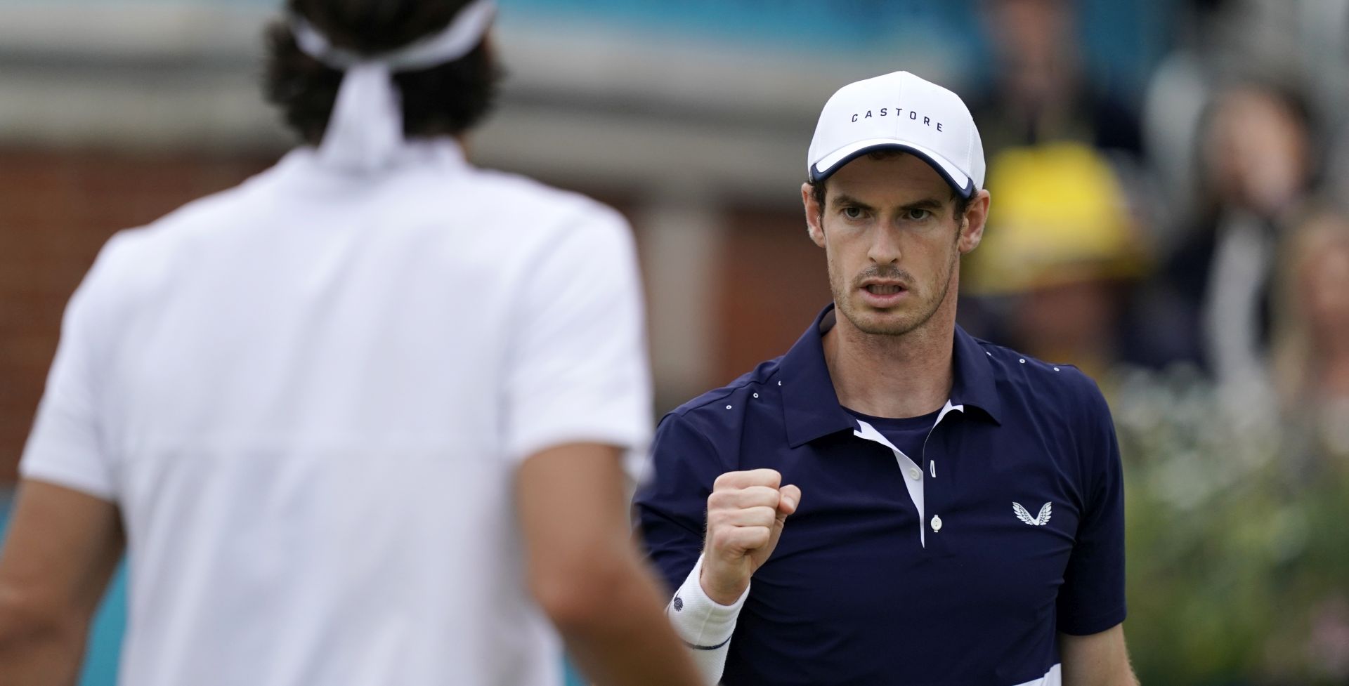 epa07669078 Britain's Andy Murray (R) with Feliciano Lopez of Spain (L) during their mens doubles final match against Britain's Joe Salisbury and Rajeev Ram at the Fever Tree Championship at Queen's Club in London, Britain, 23 June 2019. The tournament runs from 17th June till 23 June 2019.  EPA/WILL OLIVER