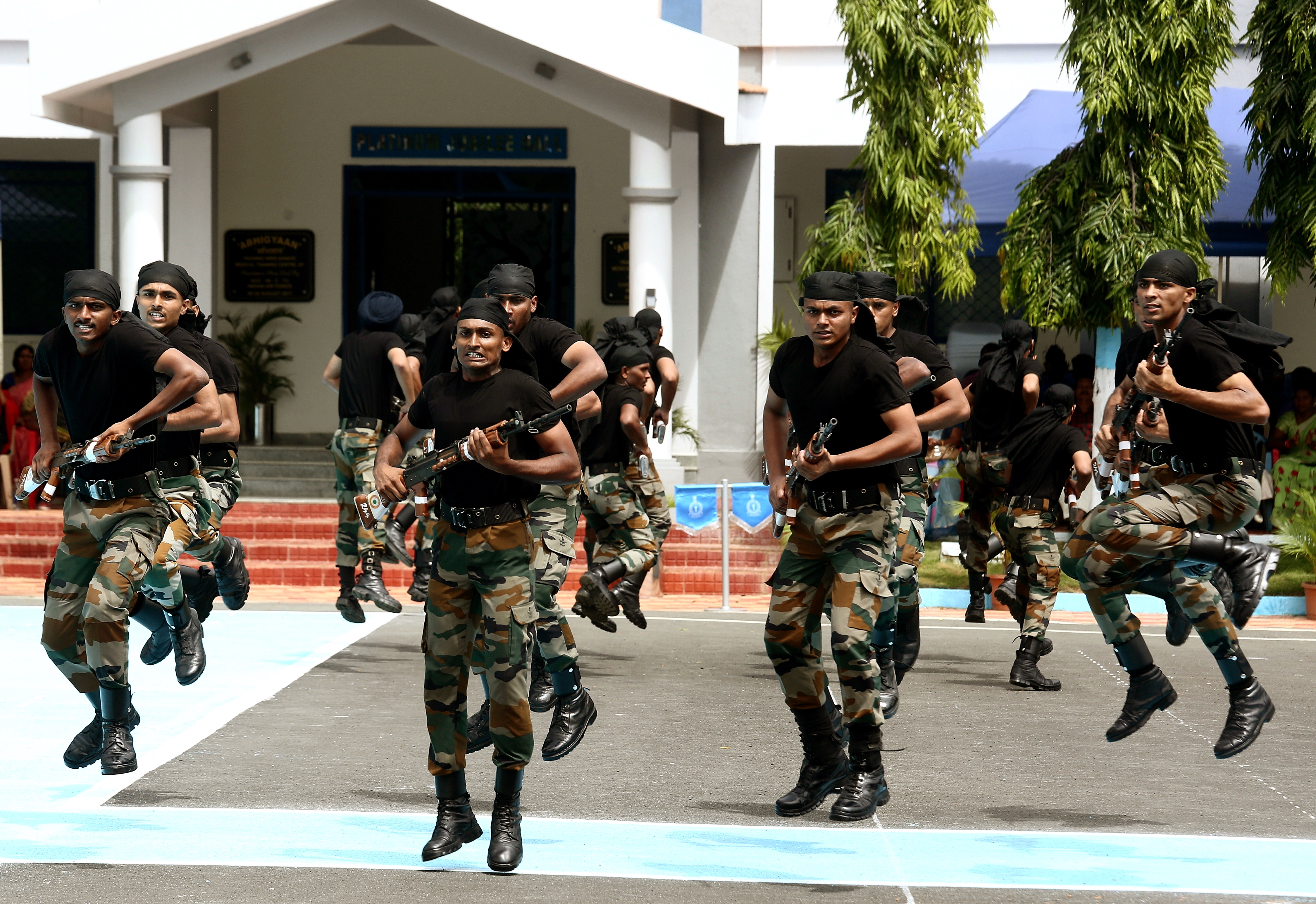 epa07679437 Indian Air Force (IAF) newly trained Medical Assistants Air Warrior Drill Team perform thrilling rifle movements in 'Combat Drill' different formations, after the passing out parade, in Bangalore, India, 28 June 2019. Around 75 trained medical assistants of Indian Air Force officers, culmination of basic military training and professional combat skills on completion of initial Joint Basic Phase Training (JBPT-24) during their 24 weeks training course.  EPA/JAGADEESH NV