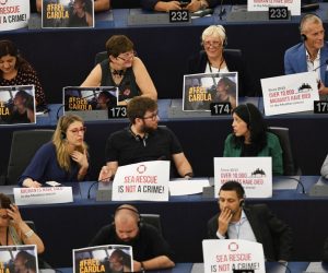 epa07688928 MEPs call for the release of See Watch captain Carola Rakete with signs at the first session of the new Parliament at the European Parliament, in Strasbourg, France, 02 July 2019. German captain Carola Rackete was arrested on 29 June reportedly after violating orders from the Italian Finance Police and entering the port of Lampedusa while ramming a patrol boat on migrant rescue ship 'Sea-Watch 3'.  EPA/PATRICK SEEGER