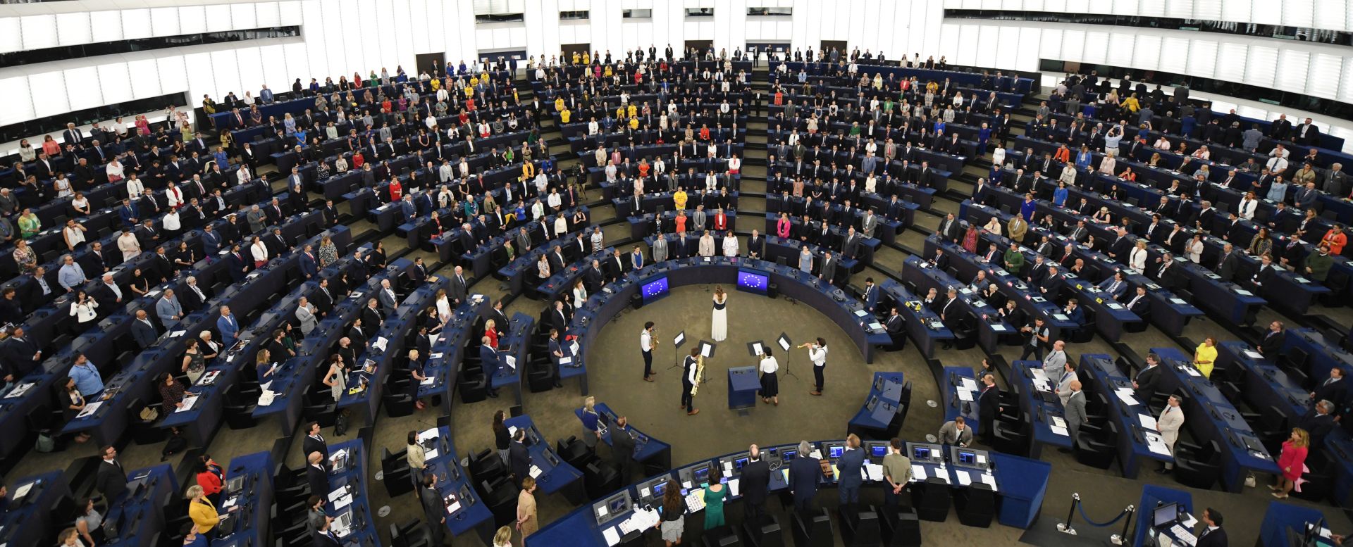 epa07688901 Brexit party members turn their backs on the musicians during the European Anthem at the first session of the new Parliament at the European Parliament, in Strasbourg, France, 02 July 2019.  EPA/PATRICK SEEGER