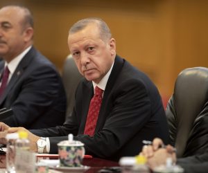 epa07689135 Turkish President Recep Tayyip Erdogan (C) sits during a meeting with Chinese President Xi Jinping at the Great Hall of the People in Beijing, China, 02 July 2019.  EPA/MARK SCHIEFELBEIN / POOL