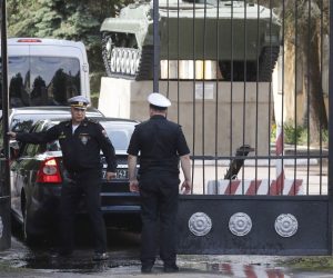 epa07691889 Russian navy officers guard an entrance of their military unit in Peterhof, St. Petersburg region , Russia, 03 July 2019. According to reports, all of the the officers who died in the Losharik vessel were based at Peterhof. 
Fourteen people died from suspected smoke poisoning aboard Losharik submarine vessel in the Barents Sea on 01 July.  EPA/ANATOLY MALTSEV