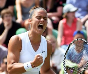 epa07696911 Maria Sakkari of Greece scores a set point winner against Elina Svitolina of Ukraine in their third round match  during the Wimbledon Championships at the All England Lawn Tennis Club, in London, Britain, 05 July 2019. EPA/FACUNDO ARRIZABALAGA EDITORIAL USE ONLY/NO COMMERCIAL SALES