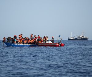 epa07704799 A handout photo made available by German civil sea rescue organisation sea-eye shows a boat carrying migrants (L) and a rescue boat of sea-eye, in the Mediterranean Sea, 08 July 2019 (issued 09 July 2019). According to sea-eye, 44 people were rescued from a woodden boat floating in the Mediterranean between Malta and Lampedusa. The migrants were taken onboard the Alan Kurdi rescue vessel operated by sea-eye and are expected to be transferred to land by the Maltese Navy.  EPA/FABIAN HEINZ / SEA-EYE HANDOUT  HANDOUT EDITORIAL USE ONLY/NO SALES