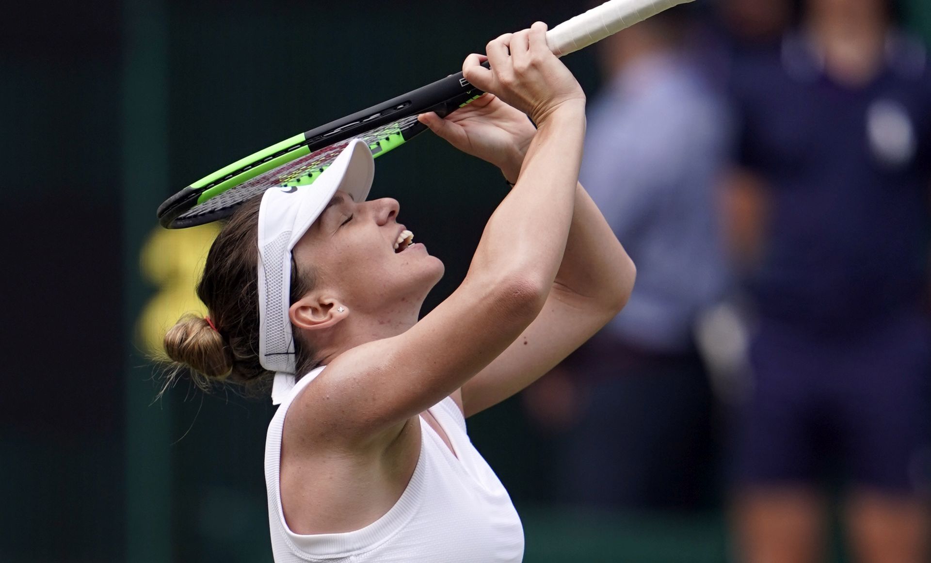 epa07710041 Simona Halep of Romania celerates her straight sets win over Elina Svitolina of Ukraine whom she defeated in their semi final match during the Wimbledon Championships at the All England Lawn Tennis Club, in London, Britain, 11 July 2019. EPA/NIC BOTHMA EDITORIAL USE ONLY/NO COMMERCIAL SALES