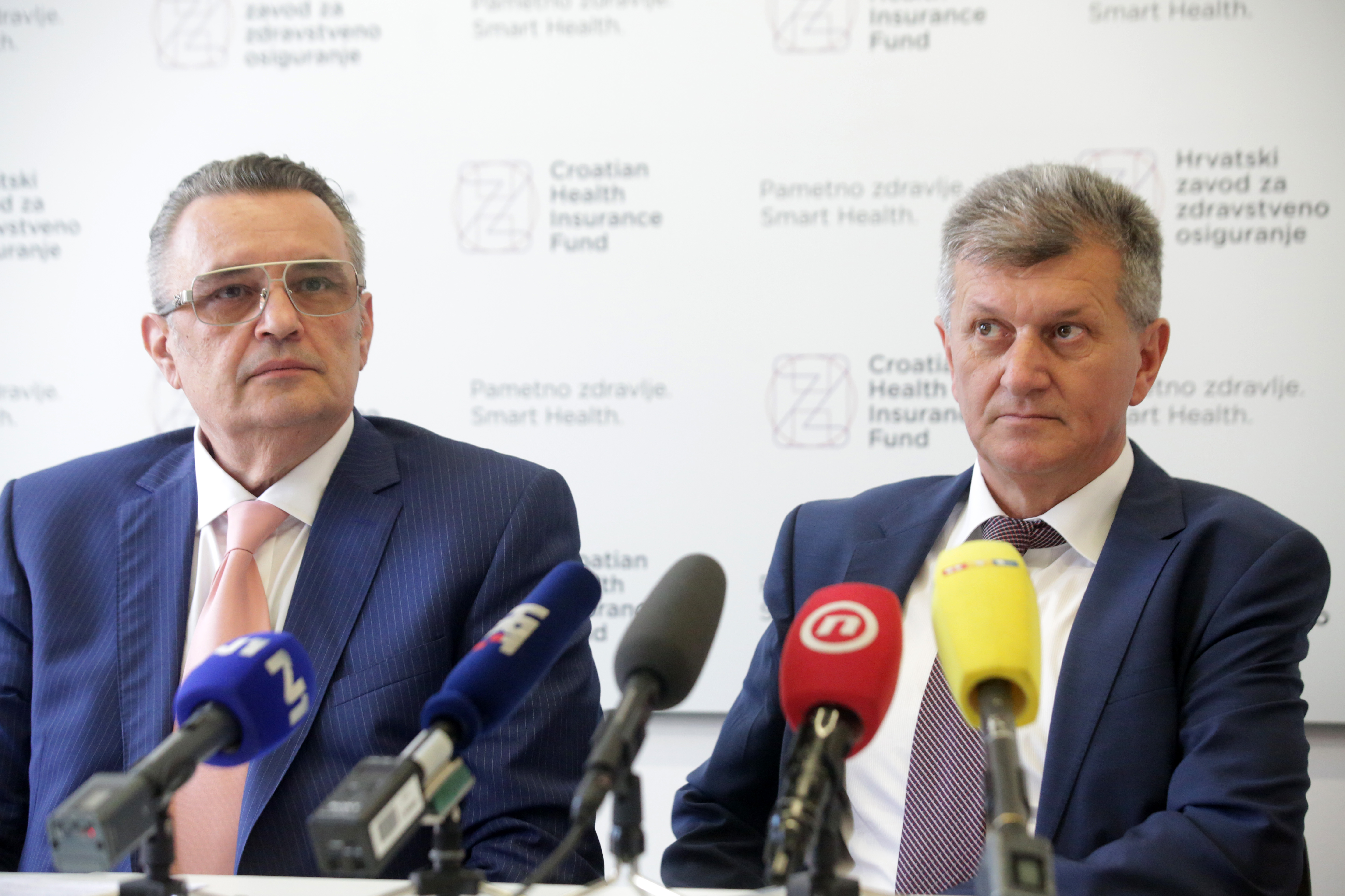 Zagreb, 12.07.2019 - Konferencija za medije na kojoj se raspravljalo o najvažnijim odlukama, između ostalih i novim lijekovima na listi lijekova HZZO-a. Na fotografiji Lucian Vukelić, Milan Kujundžić.   Foto HINA/ Daniel KASAP/ dkas