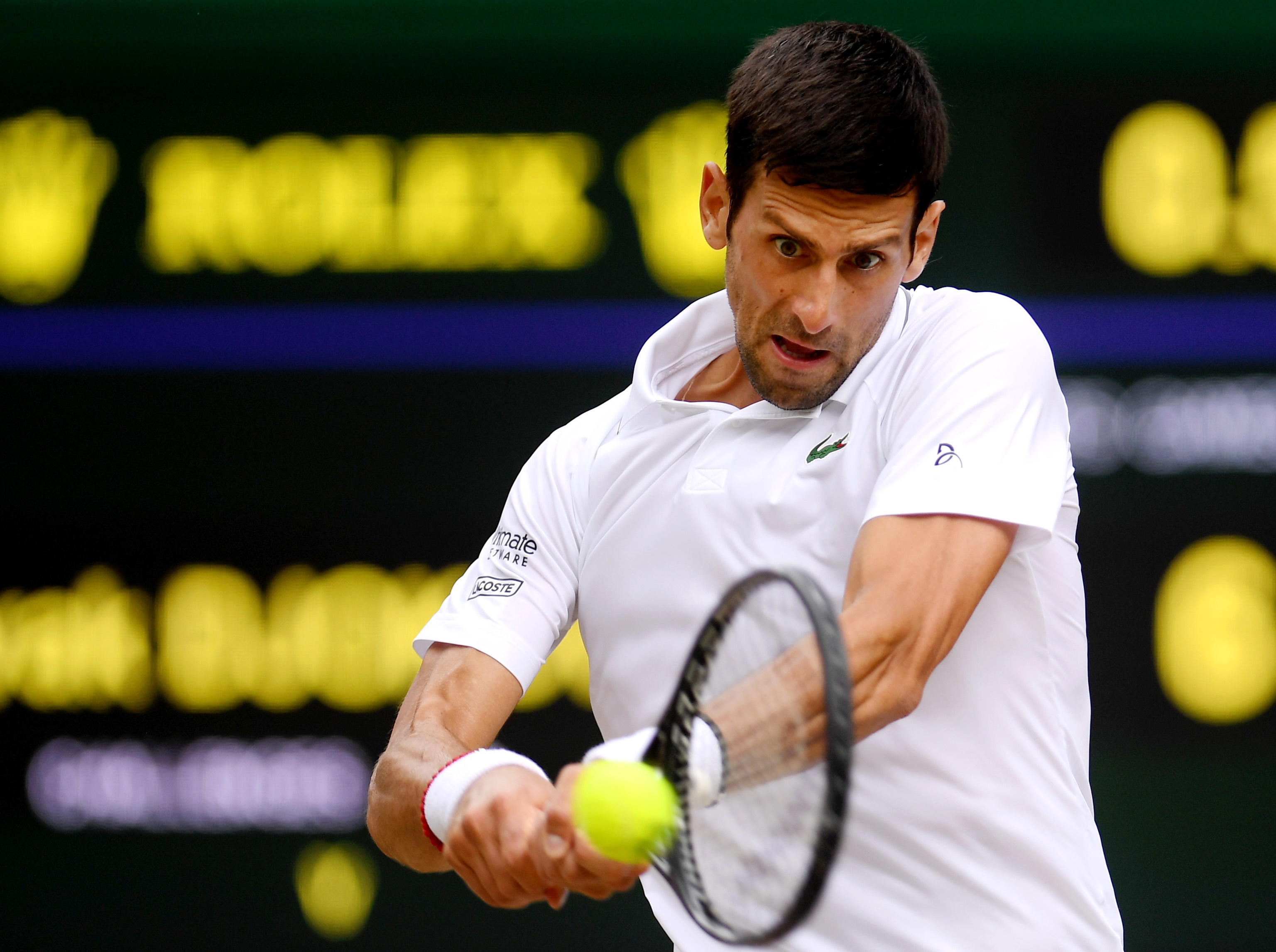 epa07716695 Novak Djokovic of Serbia in action against Roger Federer of Switzerland during their  Men's final match for the Wimbledon Championships at the All England Lawn Tennis Club, in London, Britain, 14 July 2019. EPA/Laurence Griffiths / POOL EDITORIAL USE ONLY/NO COMMERCIAL SALES *** Local Caption *** LONDON, ENGLAND - JULY 13: Serena Williams of The United States and Simona Halep of Romania embrace after their Ladies' Singles final during Day twelve of The Championships - Wimbledon 2019 at All England Lawn Tennis and Croquet Club on July 13, 2019 in Lo
