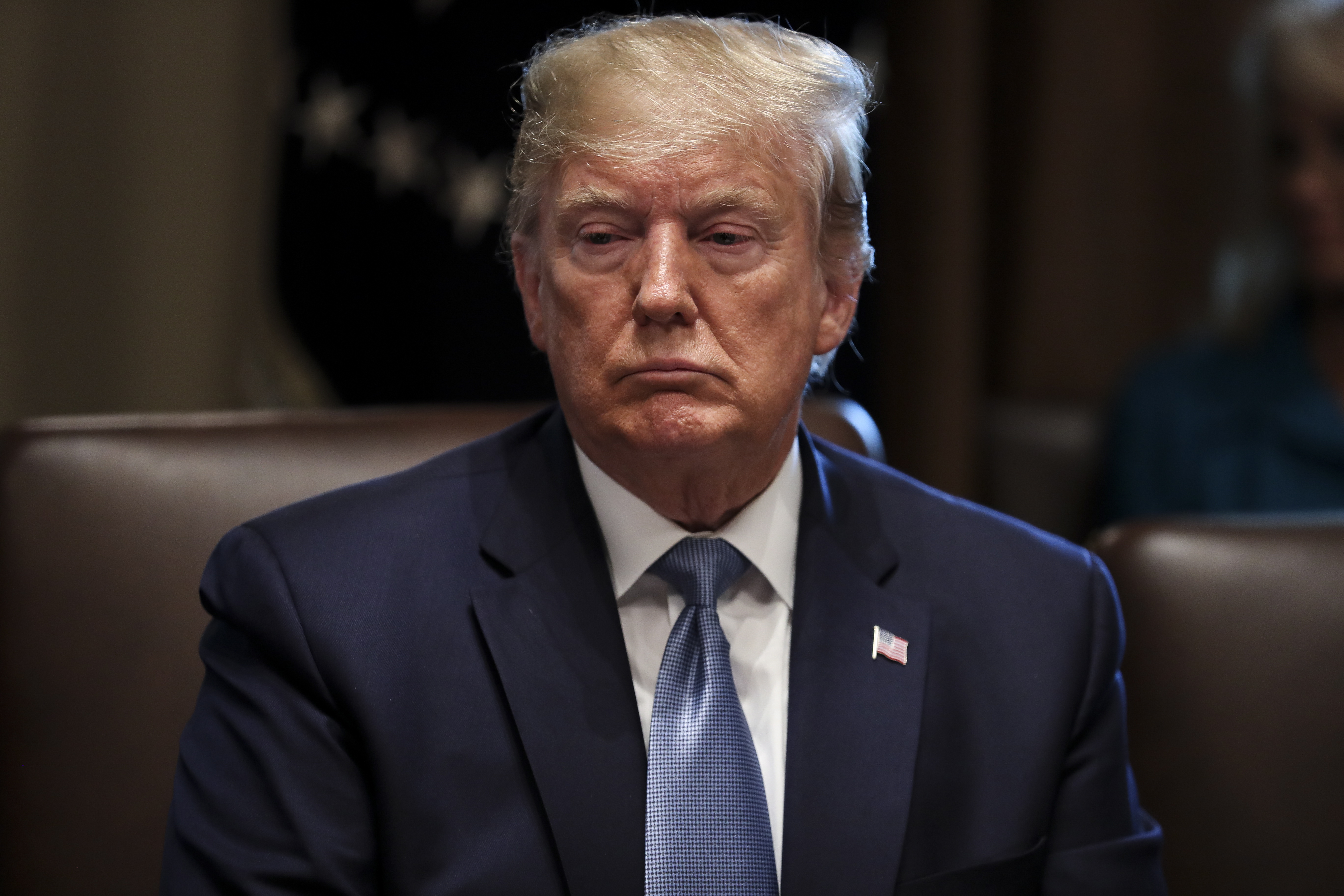 epa07720929 US President Donald J. Trump listens during a Cabinet Meeting in the Cabinet Room of the White House, Washington, DC, USA, 16 July 2019.  EPA/Oliver Contreras / POOL