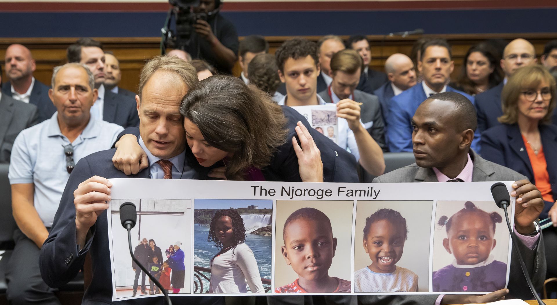 epa07722806 Democratic Representative from Minnesota Angie Craig (C) greets Ethiopian Airlines Flight 302 Boeing 737 MAX 8 crash victims family members Michael Stumo (L) and Paul Njoroge (R) during a hearing of the House Transportation and Infrastructure Committee's Aviation Subcommittee on the 'State of Aviation Safety' in the Rayburn House Office Building at the Capitol in Washington, DC, USA, 17 July 2019. Ethiopian Airlines Flight 302 crashed on 10 March 2019 killing all 157 people aboard. The Boeing 737 MAX 8 continues to be grounded worldwide.  EPA/ERIK S. LESSER