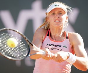 epa07727549 Jil Teichmann from Switzerland in action against Tamara Korpatsch from Germany during their quarter final match at the WTA International Ladies Open Lausanne tournament, in Lausanne, Switzerland, 19 July 2019.  EPA/LAURENT GILLIERON