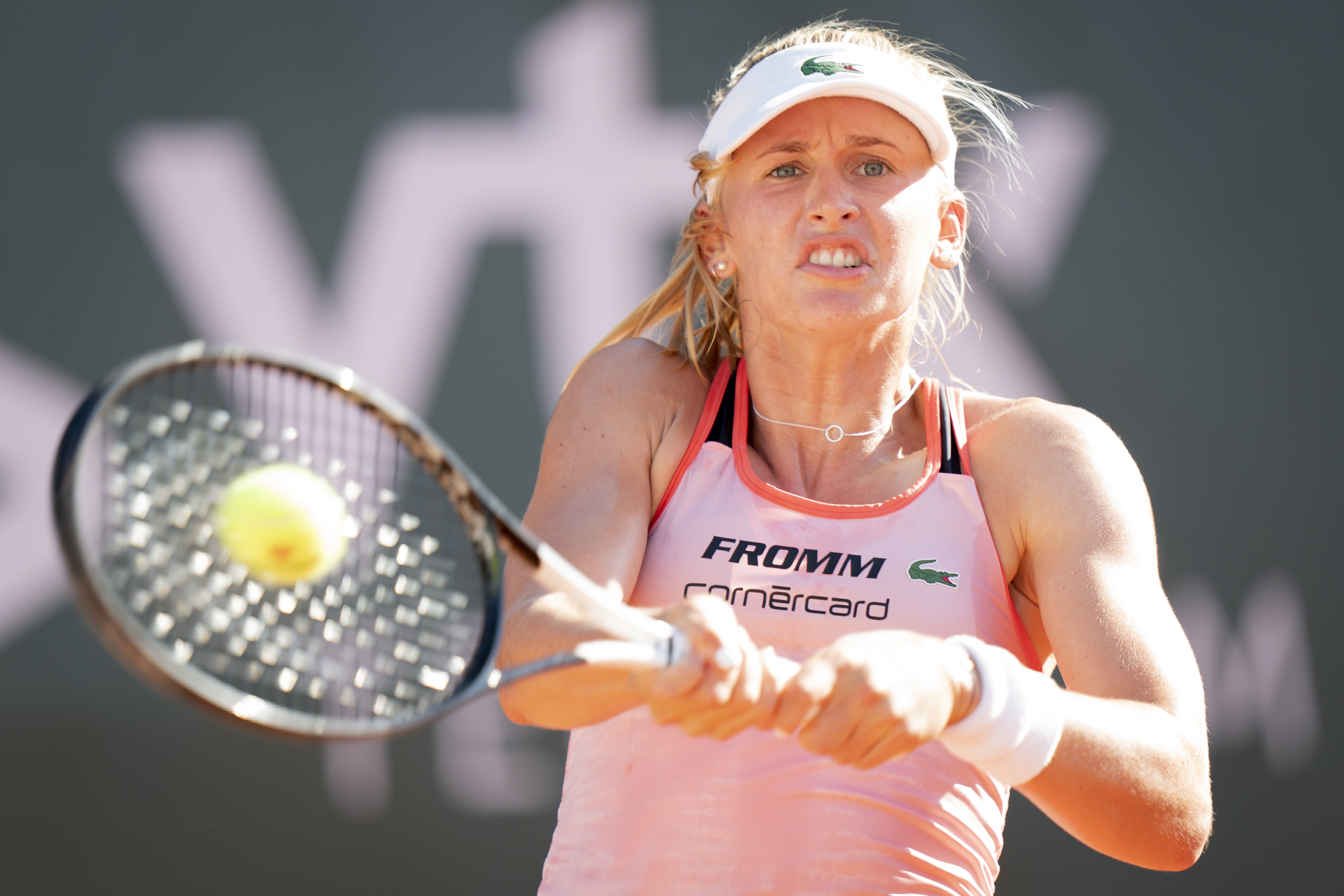 epa07727549 Jil Teichmann from Switzerland in action against Tamara Korpatsch from Germany during their quarter final match at the WTA International Ladies Open Lausanne tournament, in Lausanne, Switzerland, 19 July 2019.  EPA/LAURENT GILLIERON