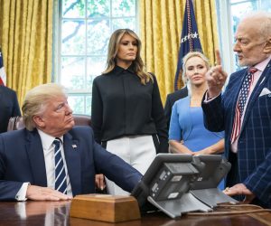 epa07727620 US President Donald J. Trump (C) welcomes astronauts Buzz Aldrin (R), Michael Collins (not pictured), and the family of Neil Armstrong to the Oval Office honor the 50th anniversary of the Apollo moon landing in the Oval Office of the White House in Washington, DC, USA, 18 July 2019. The president also answered questions about his racist tweet, and the Iranian drone shot down by American forces.  EPA/JIM LO SCALZO