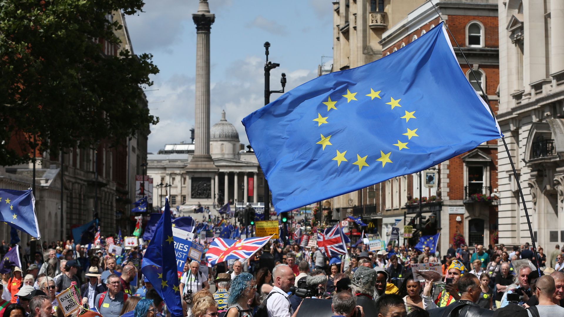 epa07729342 Anti Brexit protesters take part in the No to Boris, Yes to EU March in London, Britain, 20 July 2019. Thosuands of people gathered to march against Brexit and Boris Johnson to likely be named as the new British Prime Minister.  EPA/HOLLIE ADAMS