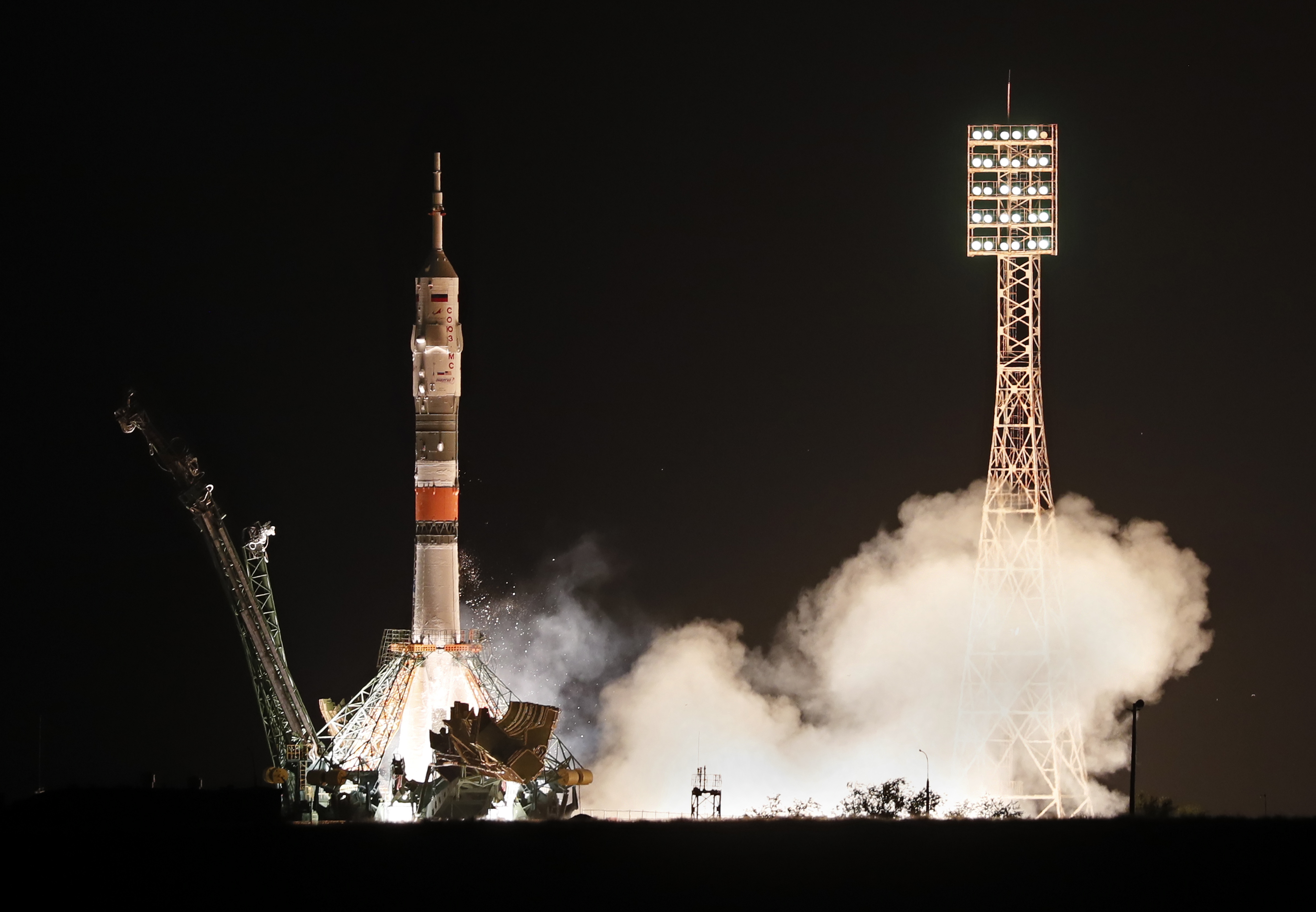 epa07729710 Soyuz MS-13 spacecraft with members of the International Space Station (ISS) expedition 60/61, NASA astronaut Andrew Morgan, Roscosmos cosmonaut Alexander Skvortsov and ESA astronaut Luca Parmitano lifts off from the launch pad at the Russian leased Baikonur cosmodrome, Kazakhstan, 20 July 2019. The launch of the mission is scheduled on 20 July from the Baikonur Cosmodrome in Kazakhstan.  EPA/YURI KOCHETKOV
