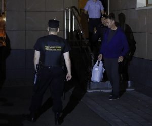 epa07738436 Russian policemen escort Russian liberal opposition leader Alexei Navalny (R) to a car after a court session at Simonovsky District court in Moscow, Russia, late 24 July 2019. Alexei Navalny was again arrested on 24 July 2019 while leaving his house for jogging. The Simonovsky District Court of Moscow arrested Alexei Navalny, the founder of the Anti-Corruption Foundation, for 30 days for appealing to participate in an unauthorized protest action on 27 July in Moscow.  EPA/SERGEI ILNITSKY