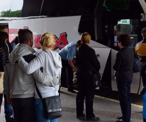 11.05.2016., Slavonski Brod - S prvog perona autobusnog kolodvora svakoga dana u 13 sati odlaze autobusi puni ocajnih Slavonaca, Brodjana, koji u svom rodnom gradu i vlastitoj domovini nemaju buducnost jer ne mogu pronaci zaposlenje. Ostvarenje snova, srecu i nadu u bolje sutra potrazit ce u Njemackoj ili dalje. Tuzna je to, ali nazalost, istinita slika rastanaka od najblizih koji ostaju, ali i domovine koja godinama tone i srlja u sve dublju propast. Vise ne vjeruju obecanjima, oni naprosto odlaze. 
Photo: Ivica Galovic/ PIXSELL
