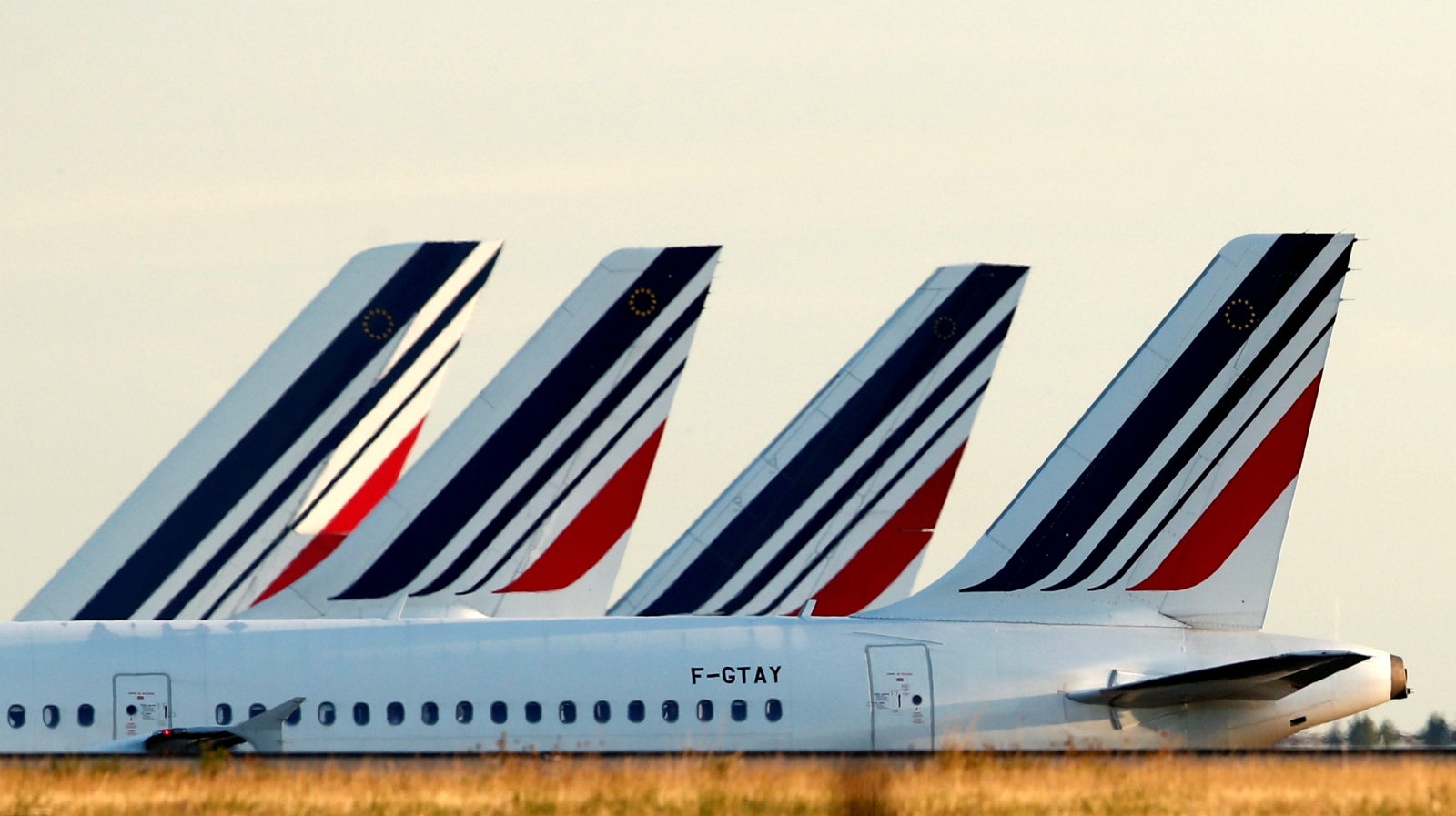 FILE PHOTO: Tails of Air France airplanes are seen at the Charles-de-Gaulle Airport in Roissy FILE PHOTO: Tails of Air France airplanes are seen at the Charles-de-Gaulle Airport in Roissy, near Paris, France, August 26, 2018. REUTERS/Christian Hartmann/File Photo Christian Hartmann
