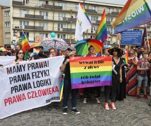 epa07731750 Participants with banners 'We have got Rights' The Laws of Physics, The laws of Logic, Human Rights' and 'Get rid of phobias, make colorful world' march in the First Equality March under the motto 'Bialystok is home for everybody' organized by the LGBT Association 'Teczowy Bialystok' in Bialystok, Poland, 20 July 2019 (issued 21 July 2019). According to reports, counter demonstrations of nationalists and far right supporters tried to block the first ever LGBTQ equality march in Bialystok throwing rocks, eggs and flash bombs into participants of equality march. Police have detained 25 people  EPA/ARTUR RESZKO POLAND OUT