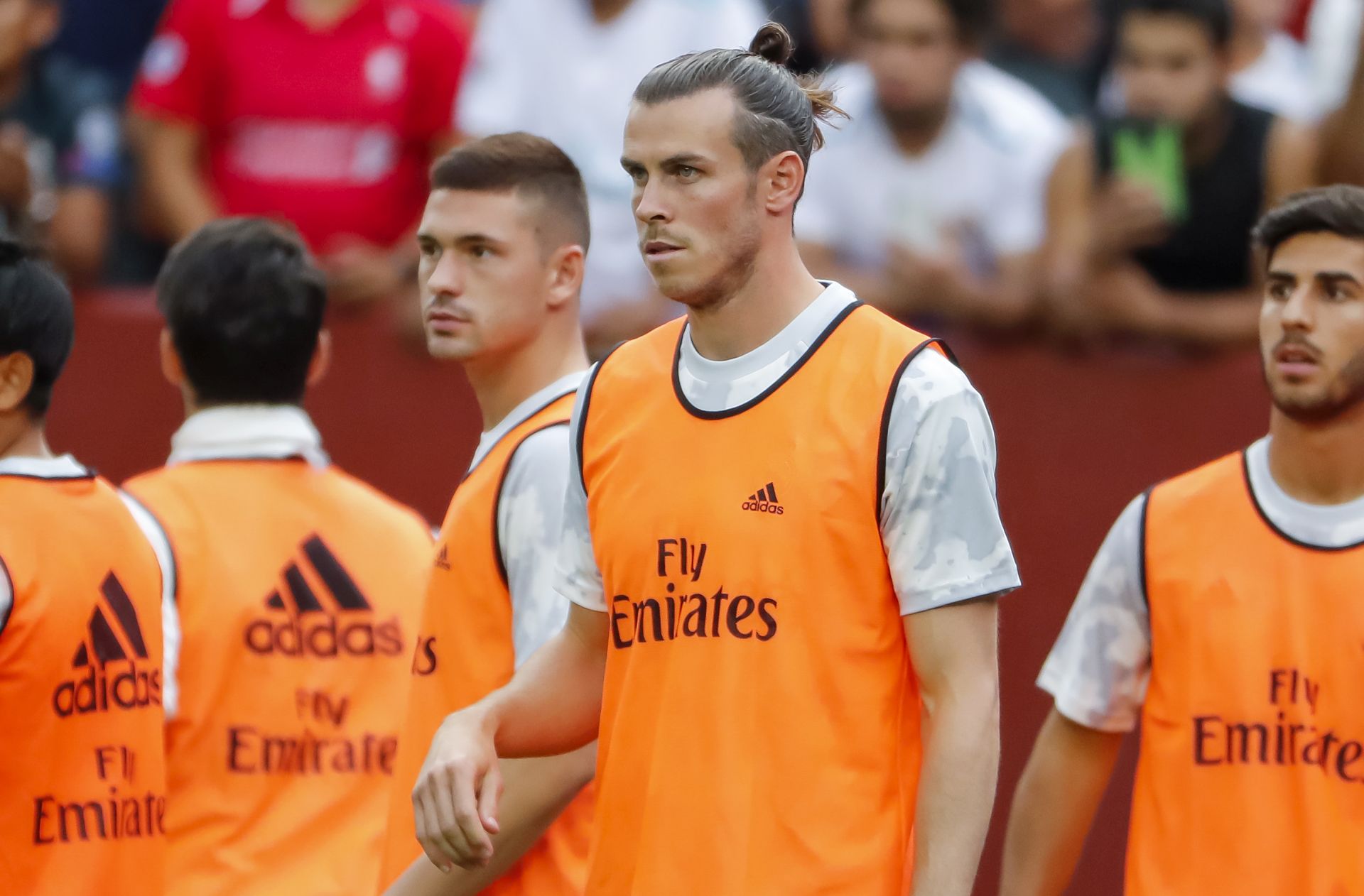 epa07736261 Real Madrid forward Gareth Bale (C) warms up during the first half of the International Champions Cup (ICC) soccer match between Real Madrid and Arsenal at FedEx Field in Landover, Maryland, USA, 23 July 2019.  EPA/ERIK S. LESSER