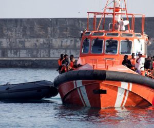 epa07753949 Some of the 46 migrants rescued by Spanish Salvamento Maritimo arrive at Motil's port in Granada, Andalusia, Spain, 02 August 2019. A total of 46 migrants were rescued near Alboran Island on board a small boat while trying to reach Spanish territory.  EPA/Miguel Paquet