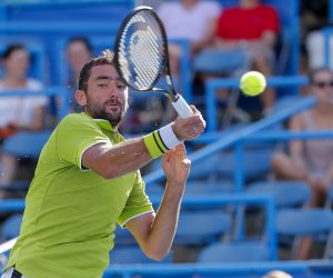epa07754180 Marin Cilic of Croatia in action against Daniil Medvedev of Russia during a quarterfinal round match in the Citi Open tennis tournament at the Rock Creek Park Tennis Center in Washington, DC, USA, 02 August 2019.  EPA/ERIK S. LESSER