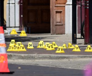 epa07756793 Evidence markers of shell casings line the street at the scene of a shooting in the Oregon District of Dayton, Ohio, USA, 04 August 2019. According to preliminary reports from police, nine people were killed and 27 others wounded and are being treated in local hospitals. The shooter was killed by police.  EPA/TOM RUSSO