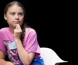 epa07757815 Swedish climate activist Greta Thunberg looks on during a press conference of the 'Fridays For Future Summit', at the University of Lausanne (UNIL), in Lausanne, Switzerland, 05 August 2019. More than 450 participants from 37 different countries will meet in Lausanne, Switzerland, from 05 to 09 August for the summer gathering of the 'Fridays for Future' movement.  EPA/JEAN-CHRISTOPHE BOTT