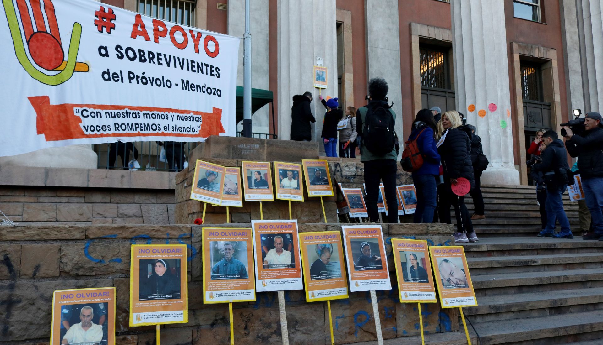 epa07758058 Members of the Provolo Survivors Support Collective meet during the hearing in the case of sexual abuse and torture against deaf and hearing impaired children of the Provolo institute, at the Lujan de Cuyo, Mendoza, Argentina, on 05 August 2019. Accused priest Horacio Hugo Corbacho Blanck and Nicola Corradi and accused former employee of the institute Armando Ramon Gomez Bravo attended the hearing.  EPA/DIEGO PARES