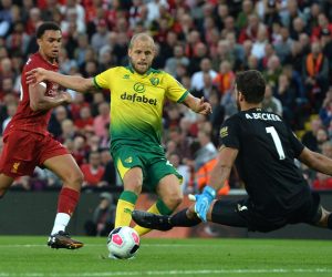 epa07764830 Teemu Pukki (C) of Norwich City  in action during the English Premier League soccer match between Liverpool FC and Norwich City at Anfield, Liverpool, Britain, 09 August 2019.  EPA/PETER POWELL EDITORIAL USE ONLY. No use with unauthorized audio, video, data, fixture lists, club/league logos or 'live' services. Online in-match use limited to 120 images, no video emulation. No use in betting, games or single club/league/player publications