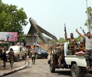 epa07766720 Armed members of a separatist southern group celebrate after seizing a military base during clashes with government forces in the southern port city of Aden, Yemen, 10 August 2019. According to reports, separatist forces in southern Yemen, backed by the United Arab Emirates, have seized all military bases belonging to the Saudi-backed Yemeni government in the southern city of Aden after four days of fighting between the two sides.  EPA/NAJEEB ALMAHBOOBI