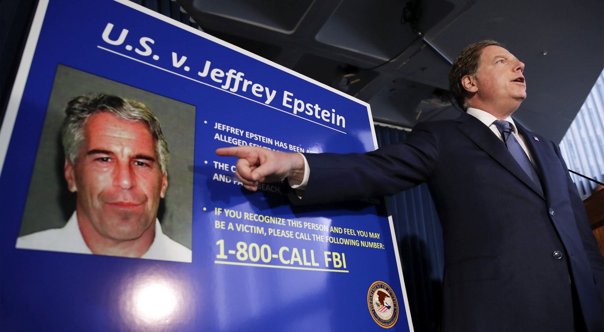 epa07766214 (FILE) - United States Attorney for the Southern District of New York Geoffrey Berman (R) points as he speaks during a news conference about the arrest of American financier Jeffrey Epstein in New York, USA, 08 July 2019 (reissued 10 August 2019). US media reported that Epstein was found dead in his prison cell on 10 August 2019 morning in the MCC Manhattan while awaiting trial on sex trafficking charges. An official confirmation by authorities of his death is pending.  EPA/JASON SZENES