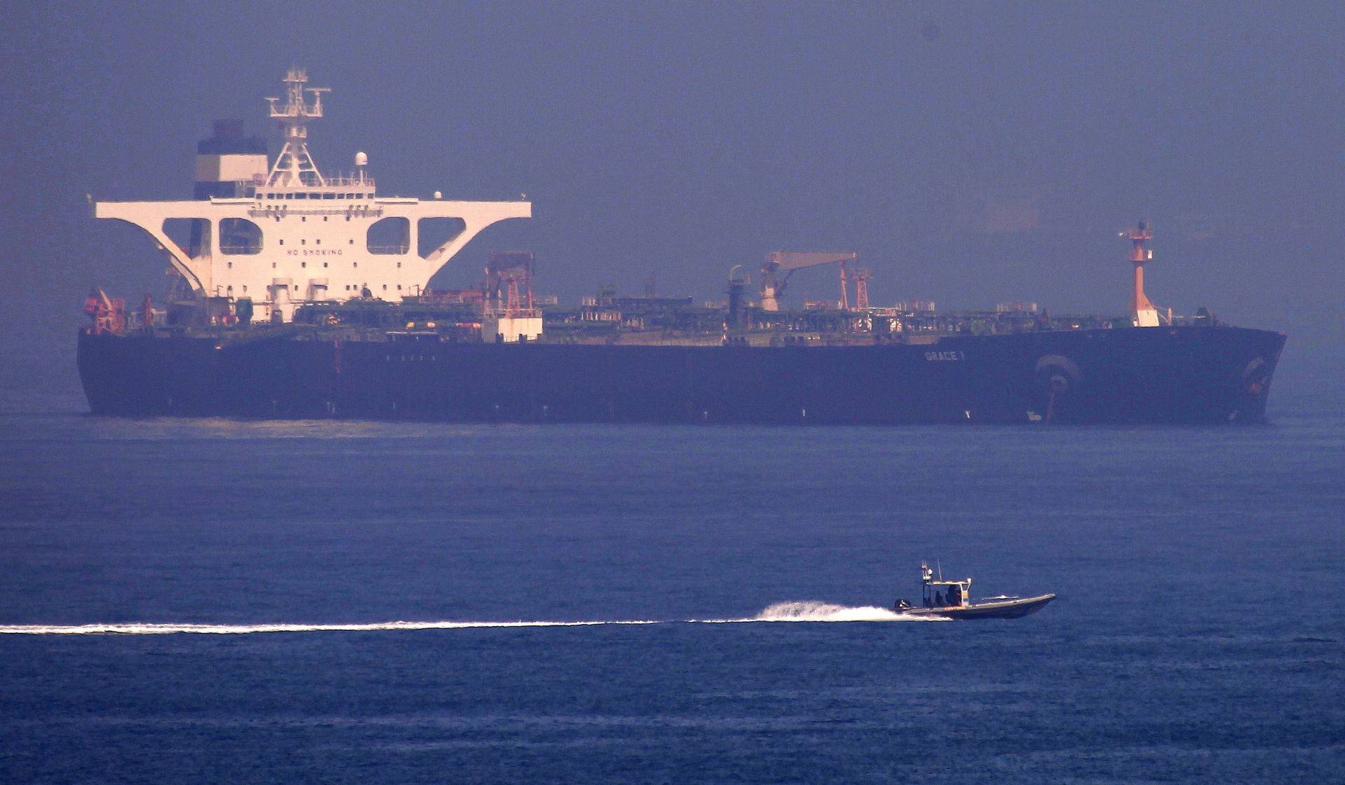epa07775043 The Iranian oil supertanker Grace 1 is seen in the Strait of Gibraltar, southern Spain, 15 August 2019. According to reports, Gibraltar has released the impounded Iranian oil tanker which was held on the suspicion it was transporting crude oil to a refinery in Syria against EU sanctions. A Gibraltar court has ruled on the release of Grace 1, despite a last minute effort by the US government asking for further detention of the supertanker.  EPA/A.CARRASCO RAGEL