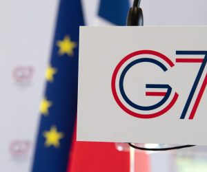 epa07782328 The G7 logo is visible in the press room before the press conference of French Minister of the Interior, Christophe Castaner, on the security measures before G7 in Biarritz, Basque Country, France, 20 August 2019. The Group of Seven (G7) summit will take place in French Bayonne (Biarritz) from 24 to 26 August 2019.  EPA/CAROLINE BLUMBERG