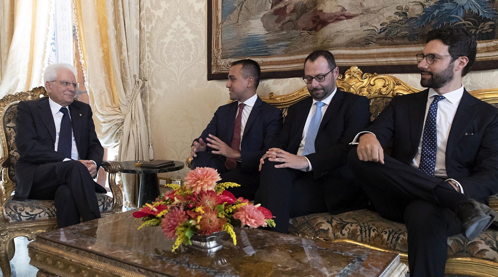 epa07786115 A handout photo made available by Quirinale Palace shows the President of the Republic Sergio Mattarella (L) with Luigi Di Maio M5S leader and his party members Francesco D'Uva (R) and Stefano Patuanelli (2-R) at Quirinale Palace for the first round of formal political consultations following the resignation of Prime Minister Giuseppe Conte, in Rome, Italy, 22 August 2019.  EPA/PAOLO GIANDOTTI QUIRINALE PALACE HANDOUT  HANDOUT EDITORIAL USE ONLY/NO SALES