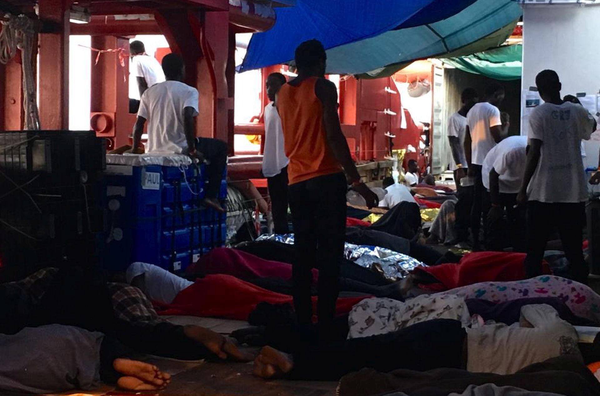 epa07787616 A handout photo made available by SOS Mediterranee shows rescued migrants onboard the Ocean Viking rescue vessel in the Mediterranean Sea, 23 August 2019. According to reports, the Maltese Government has allowed the vessel to disembark of the 356 migrants on board of the vessel. Six European countries, Germany, France, Ireland, Luxembourg, Portugal and Romania, agreed to take in the migrants who were rescued in different operations.  EPA/AVRA FIALAS / SOS MEDITERRANEE HANDOUT  HANDOUT EDITORIAL USE ONLY/NO SALES